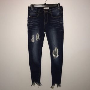 Machine skinny jeans with holes